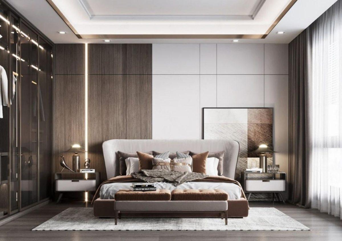 Bedroom with wood paneling and crescent wall art